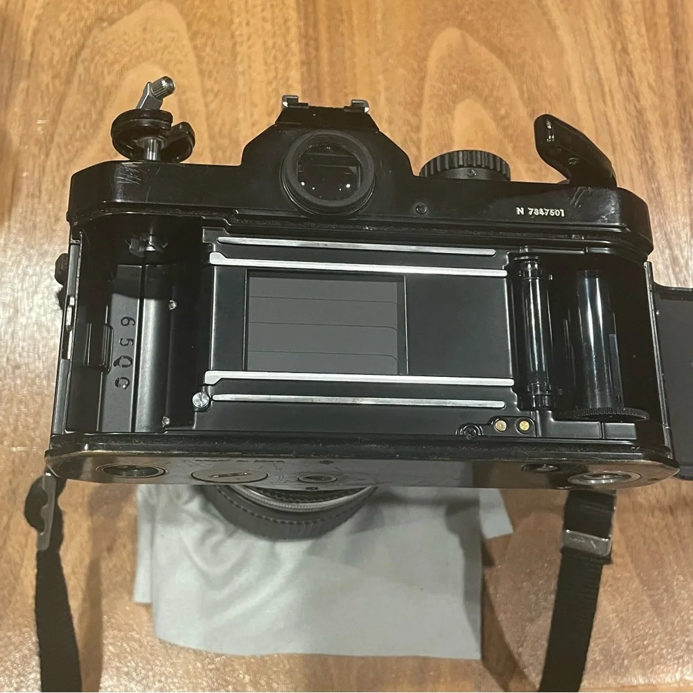 Vintage Nikon FM2 black camera with lens